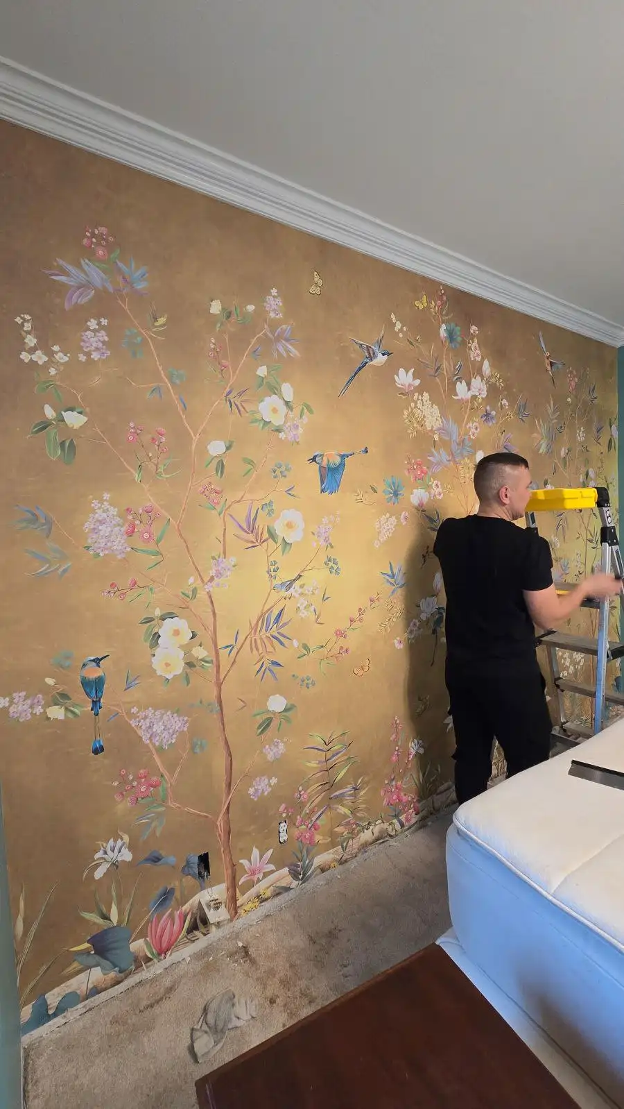 Careful wallpaper installation around historic trim